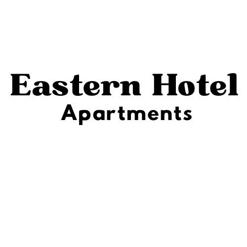 A black and white image of a sign that says "Eastern Hotel Apartments".